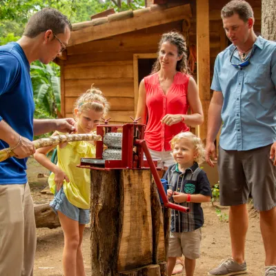 A family enjoying a demonstration at the park