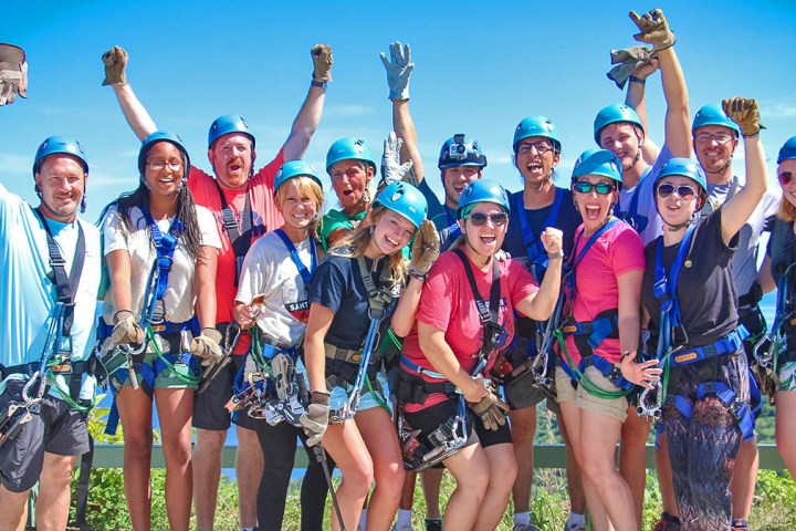 A group of zipliners posing for a picture