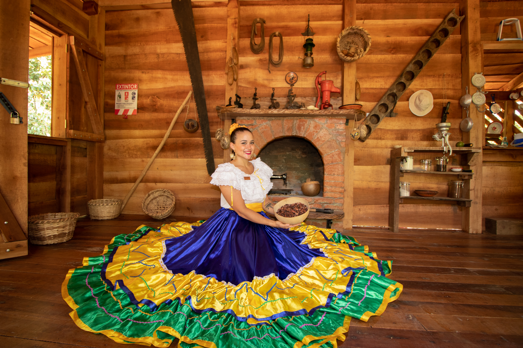 girl in a costa rican dress at traditional house