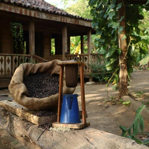 a vase sitting on a bench