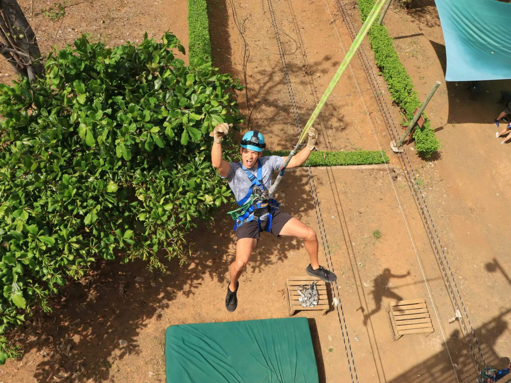 a man walking down a dirt road