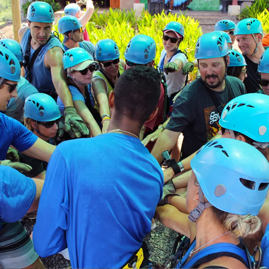 A group of people doing a group celebration