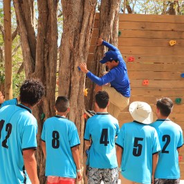 a group of people wearing blue shirts and shirt