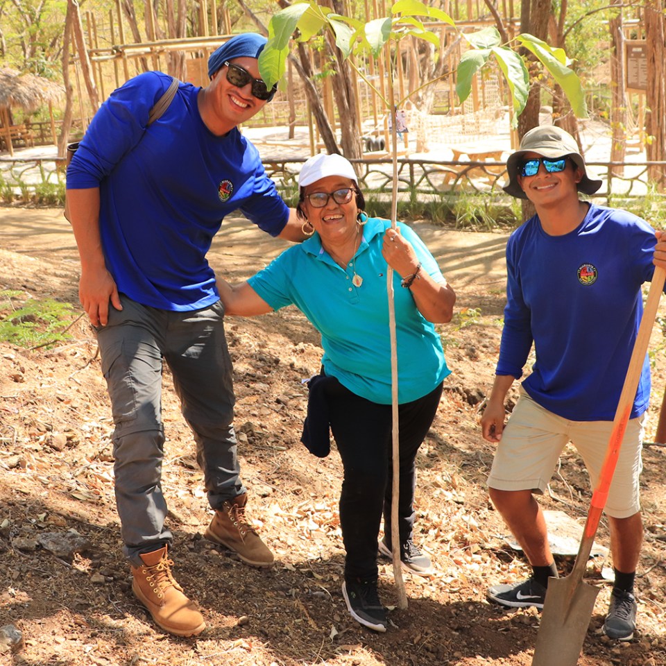 a couple of people that are standing in the dirt