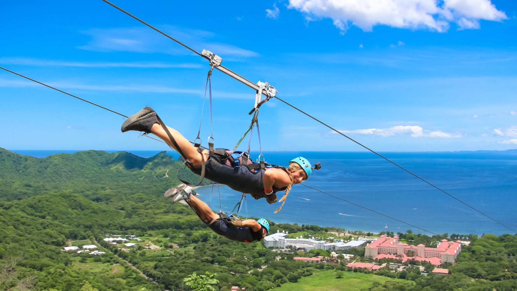two people on a zipline