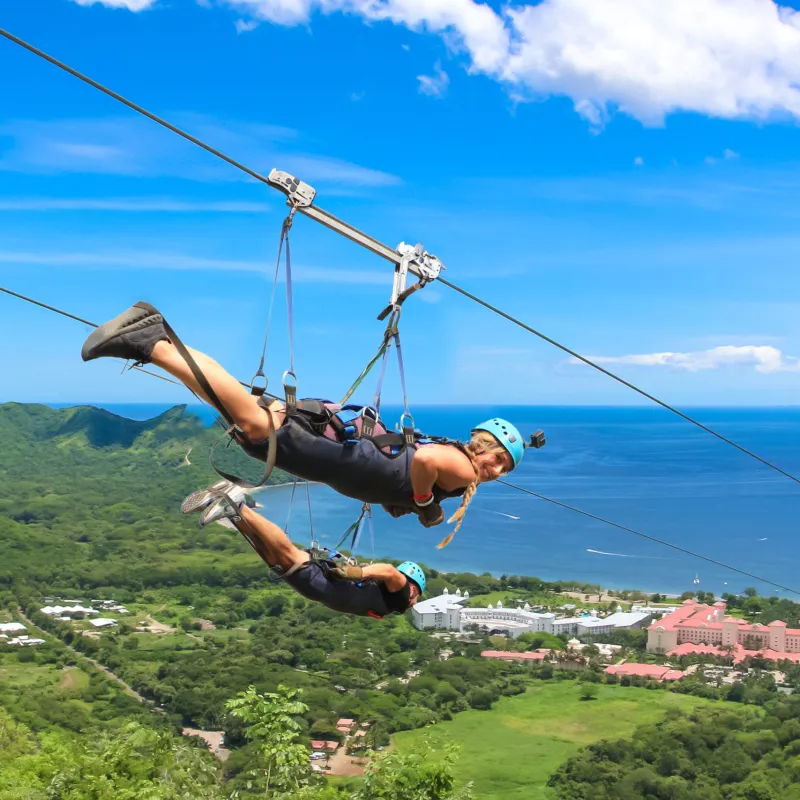 two people on a zipline